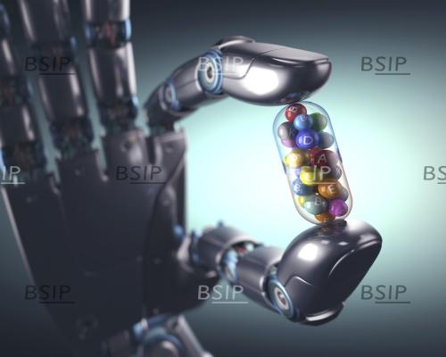 Robotic hand holding multivitamin