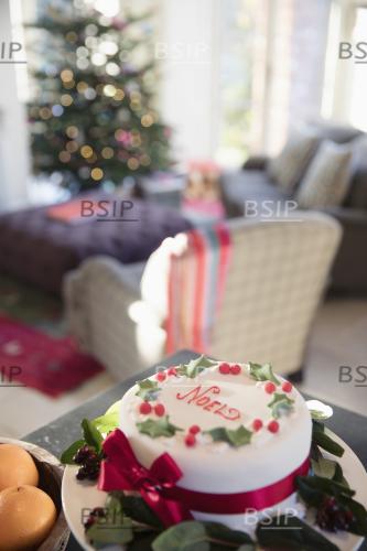 Decorated noel Christmas cake on sideboard
