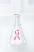 Breast cancer awareness ribbon in a flas...